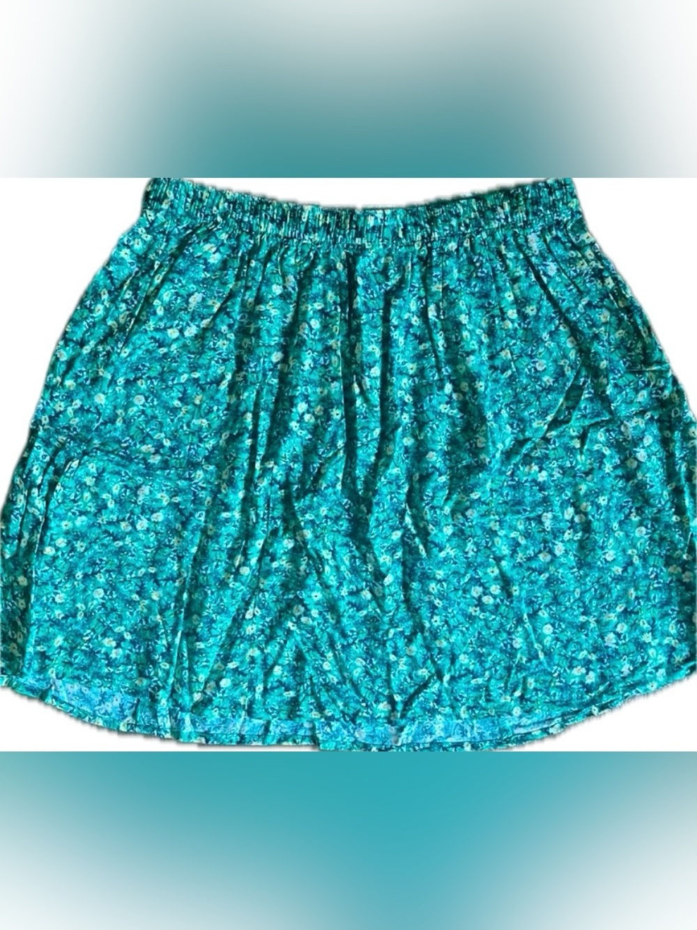Old Navy floral teal mini skirt. Excellent condition. Women’s size Large